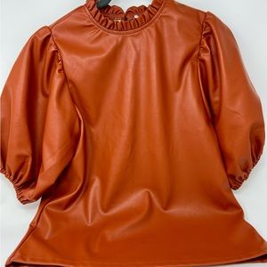 NWT. T H L M faux leather short sleeve shirt with ruffle detail. Rust. XS